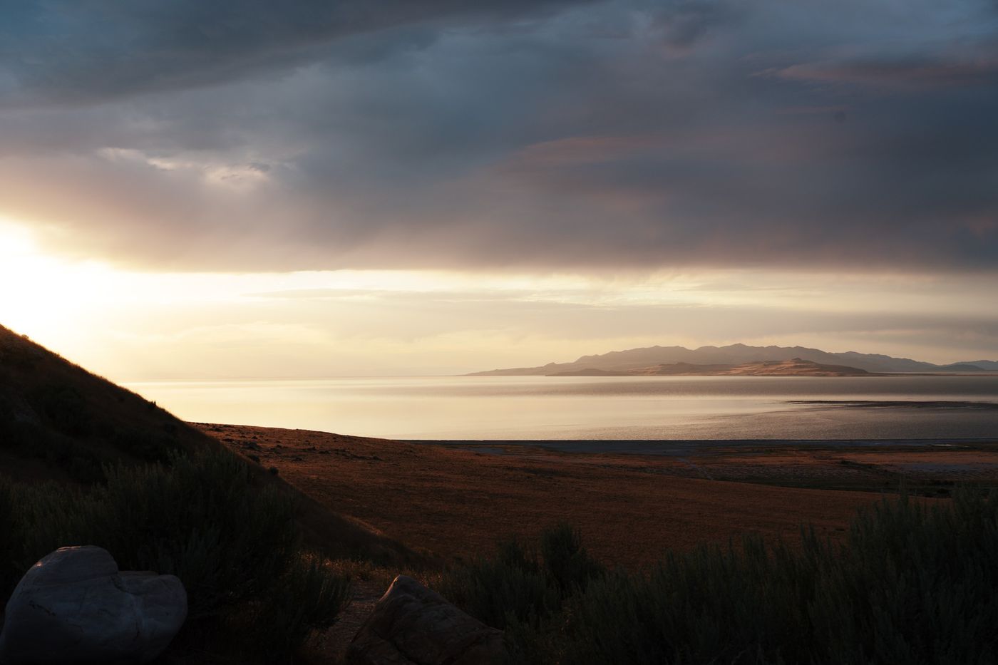 The lake under a moody sunset with Classic Chrome