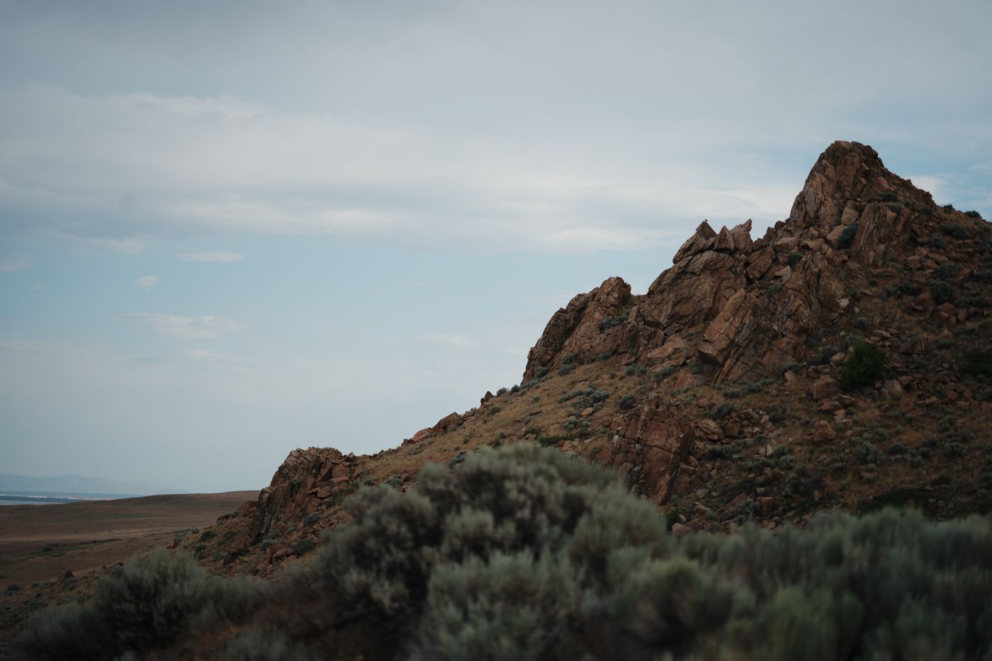 A rocky ridge under a soft sky, edited with Marfil