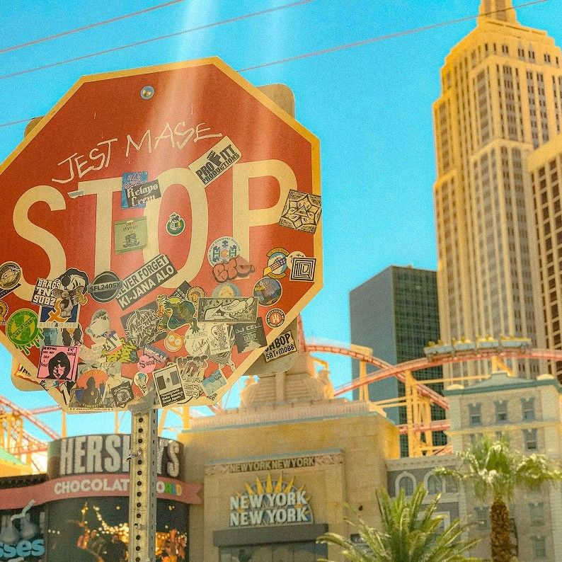 A sticker-covered stop sign in Las Vegas, edited with Pastel